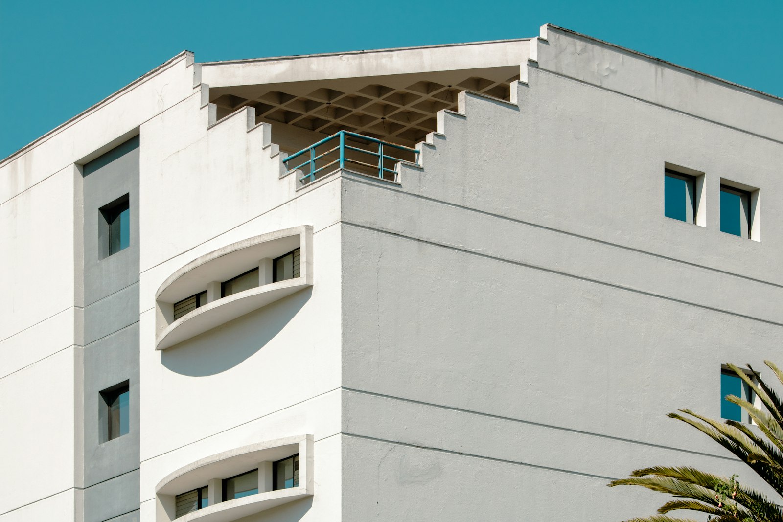 Modern white residential building with balconies